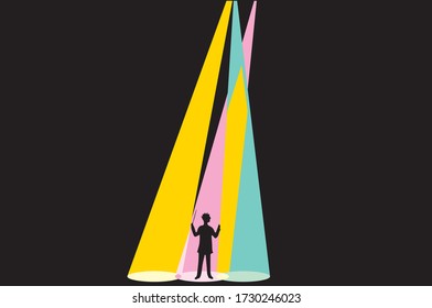 an orchestra conductor illuminated by colored lights