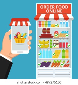 Order food online. Hand holding smartphone and basket with food on the screen. Nearby refrigerator with selected food. Flat vector illustration.