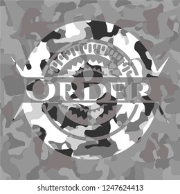 Order on grey camo pattern