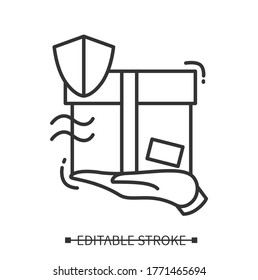 Order protection icon. Parcel box on palm with shield pictogram, concept of safe contactless express post order delivery. Linear editable stroke vector illustration for web, ui, retail and logistic 