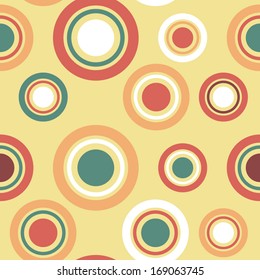 Ordered circles seamless pattern - red, orange and green colors.