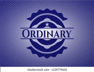 Ordinary badge with denim background
