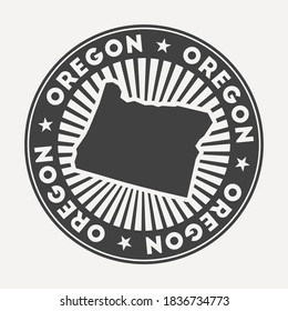 Oregon round logo. Vintage travel badge with the circular name and map of us state, vector illustration. Can be used as insignia, logotype, label, sticker or badge of the Oregon.