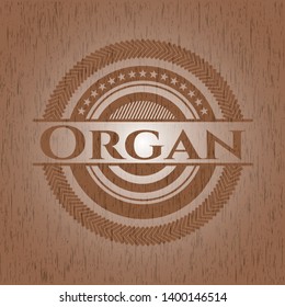 Organ badge with wooden background