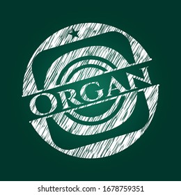 Organ chalkboard emblem written on a blackboard. Vector Illustration. Detailed.