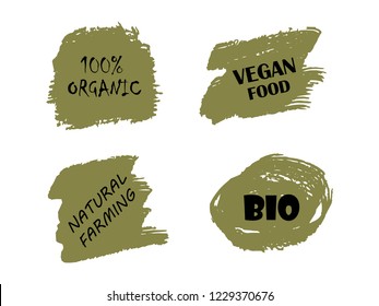 Organic, 100% bio, eco, natural product, vegan food, natural farming, vegetarian labels. Vector collection of paint brush strokes isolated on white background. Hand drawn abstract design elements set.