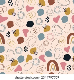 Organic blob shapes seamless surface pattern. Aesthetic whimsical arrangement of hand drawn basic doodle squiggles, blotches, scribbles and confetti. Allover print pebble textured background. 