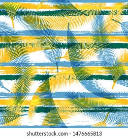 Organic coconut palm leaves tree branches over painted stripes seamless pattern design. Hawaiian exotic foliage beach fashion fabric print. Geometric floral tropical leaves seamless.