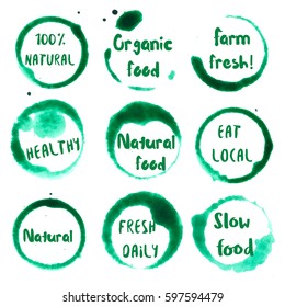 Organic Food collection of round watercolor stains with natural, 100%, eat local, farm fresh, organic food, healthy, fresh daily, slow text. Set of vector Organic Food stamps.