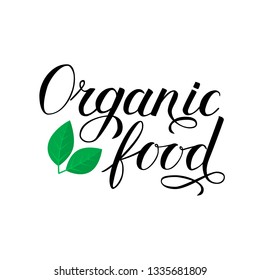 Organic food hand written phrase with green leaves isolated on white. Calligraphy lettering sign. Healthy food concept. Vector logo design  for fresh market, restaurant, farm, store, etc. 