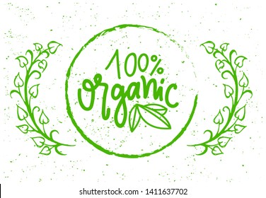 Organic food simple label on grunge background with tree branches. Vector 100 percent guarantee isolated green creative logo in round frame, greenery and leaves