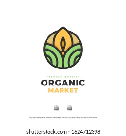 Organic logo. Farmer products emblem. Leaves and sun in a circle.