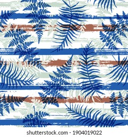 Organic new zealand fern frond and bracken grass overlaying stripes vector seamless pattern. Brazilian jungle foliage swimwear textile print. Stripes and tropical leaves illustration.