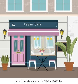 Organic Vegan Cafe In A Flat Style. Exterior Of Cafe In London, New York, Los Angeles. Cute Cafe. Eco Style. Classic Blue Exterior.