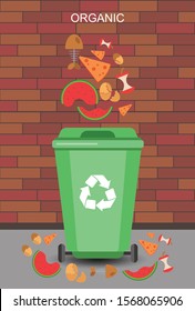 Organic waste lying in open green trash container. Leftover food in dumpster isolated on background. Fruits, vegetables, bread and other edible products in garbage bin