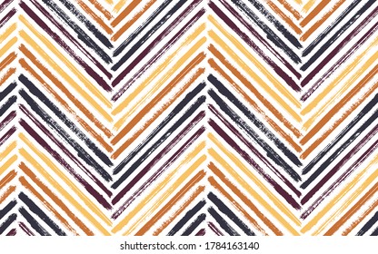 Organic zig zag fashion print vector seamless pattern. Paintbrush strokes geometric stripes. Hand drawn paint texture zig zag chevron background. Watercolor fabric print seamless design.