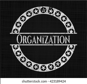 Organization chalk emblem written on a blackboard