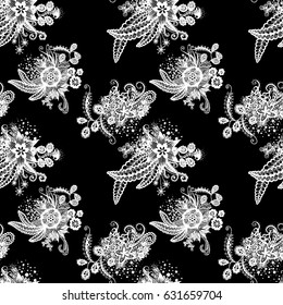 Orient Seamless Pattern. Floral Zentangle with White Motives on Black Background. Dark Pattern for Wallpaper, Textile, Linen, Curtains. Vintage Indian Ornament with Flowers, Leaves, Buds and Branches.