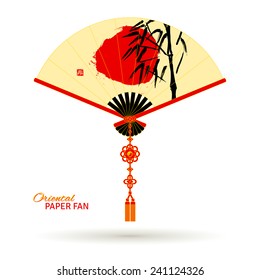 Oriental Asian paper fan with traditional ink painting. Bamboo and red sun in sumi-e style. Stamp with hieroglyph for 'Blessing'. Red and golden tassel with yin yang symbol and knot elements. Vector