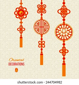 Oriental Asian red and golden tassel decorations. Lotus image, yin yang symbol and knot elements. Stamp with a Chinese hieroglyph for 'joy'. Asian seamless background with knot compositions. Vector