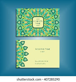 Oriental business card mockup with green round mandala pattern and ornament, floral card design layout template. Size 85mm x 65mm. Front and back sides. Editable and movable objects. EPS 10.