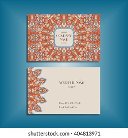Oriental business card mockup with red and blue round mandala pattern and ornament, floral card design layout template. Size 85mm x 65mm. Front and back sides. Editable and movable objects. EPS 10.