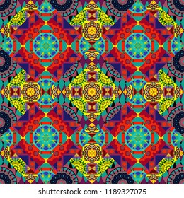 Oriental ethnic ornament in green, red and blue colors. Colorful seamless pattern in mosaic style. Textile fabric paper print. Stylized floral doodle background. Vector patchwork quilt pattern.