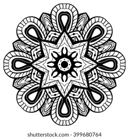 Oriental filigree mandala. Round vector design element of a black contour on a white background.