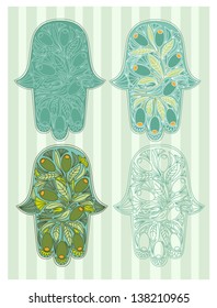 Oriental hamsa hands set with olives decoration
