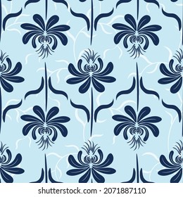 Oriental Indian floral seamless pattern with blue flowers on the light blue background. Great for wallpaper, fabric, packaging.