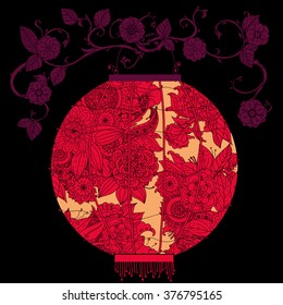 Oriental lantern decorated with floral patterns hang on tree Red on black background