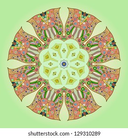 Oriental mandala motif round lase pattern on the yellow background, like snowflake or mehndi paint on green color background