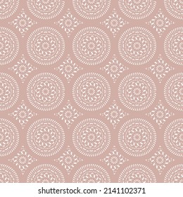 Oriental ornamental seamless mandala pattern with lacy ornaments on pastel pinkish background. Print for fabric wallpaper