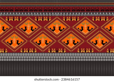 Oriental pattern ,swans embroidered on orange and red woven,tradition pattern,weaving culture,ethnic unique design,Thai weaving inspiration design for costume clothing,wrapping,printing,textile
