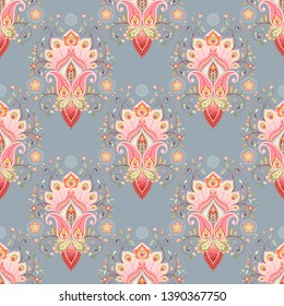 Oriental seamless background with paisley flower and peacock feathers