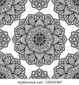 Oriental seamless pattern of mandalas. Filigree black and white background. Template for textile, carpet, wallpaper, shawl.