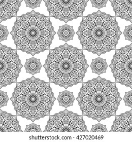 Oriental seamless pattern of mandalas. Vector black and white background.