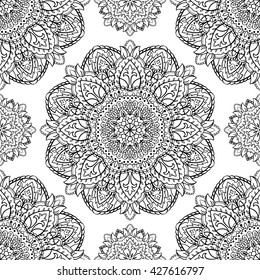Oriental seamless pattern of mandalas. Vector black and white floral background. Template for textile, carpet, wallpaper, shawls.