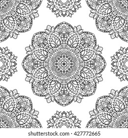 Oriental seamless pattern of mandalas. Vector black and white floral background. Template for textile, carpet, wallpaper, shawls.