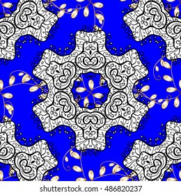 Oriental seamless pattern of white flowers and mandalas. Vector blue background.