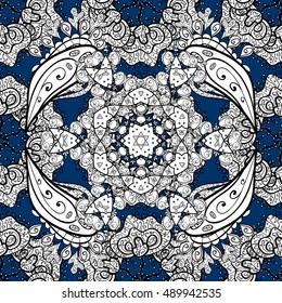 Oriental seamless pattern of white flowers and mandalas. Vector dark blue background.