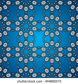 Oriental seamless pattern of white flowers and mandalas. Vector blue background.