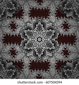 Oriental style arabesques. Seamless pattern on brown background with white elements. Openwork delicate white pattern. Vector. Seamless white texture curls. Brilliant lace, stylized flowers, paisley.