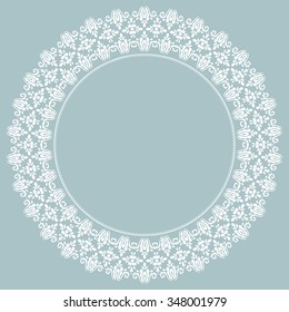 Oriental vector abstract round frame with arabesques and floral elements. Light blue and white colors
