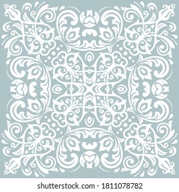 Oriental vector light blue and white pattern with arabesques and floral elements. Traditional classic ornament. Vintage pattern with arabesques