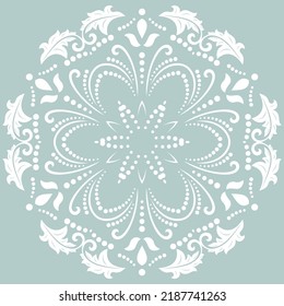 Oriental vector ornament with arabesques and floral elements. Traditional light blue and white round classic ornament. Vintage pattern with arabesques