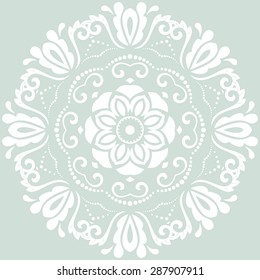 Oriental vector pattern with arabesque and floral elements. Traditional fine ornament. Light blue and white pattern.