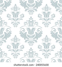 Oriental vector pattern with damask, arabesque and floral elements. Seamless abstract background. Blue and white colors