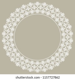 Oriental vector round white frame with arabesques and floral elements. Floral border with vintage pattern. Greeting card with place for text