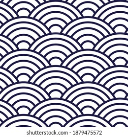 Oriental wave pattern from Japan in blue. Seamless classic japanese kimono pattern, round pattern with shell or fish scales motifs. Asian or chinese abstract ornament. For wrapping or textile design